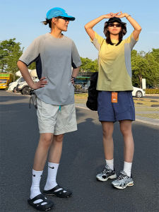 กางเกงขาสั้นผู้ชายแห้งเร็วสำหรับเล่นกีฬากลางแจ้งแบบบางระบายอากาศได้ดี กางเกงขายาวทรงหลวมสบาย ๆ สำหรับฤดูร้อน