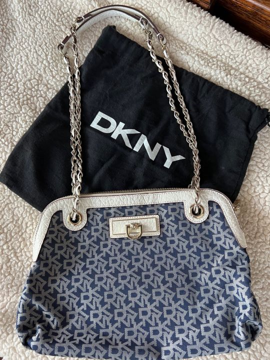 Dkny ราคา discount ของ แท้