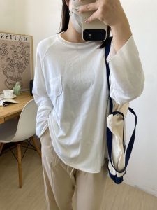 เสื้อยืดคอกลมแขนยาวผ้าฝ้ายบางหลวมๆ สบายๆ สำหรับใส่ในบ้านและออกกำลังกาย ดีไซน์ไม่มีรอยต่อ ทรงหลวมๆ สำหรับผู้หญิง