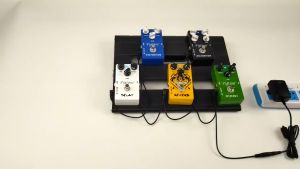 Adaptor Pedal Efek Gitar Adaptor Daya Stompbox Gitar Listrik AC 110-240V DC 9V 1A dengan Steker EU/US untuk Papan Efek Gitar