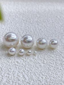 ลูกปัดมุกสีขาว ลูกปัดวัสดุสำหรับทำเครื่องประดับ DIY ลูกปัดวัสดุสำหรับทำสร้อยคอ สร้อยข้อมือ โซ่เสื้อกันหนาวสำหรับผู้หญิง