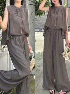 ชุดสองชิ้นแฟชั่นฤดูร้อน 2025 สำหรับผู้หญิง ทรงหลวม แขนกุด เอวสูง กระโปรงยาวคลุมเข่า เสื้อผ้าทำงานสไตล์เกาหลี