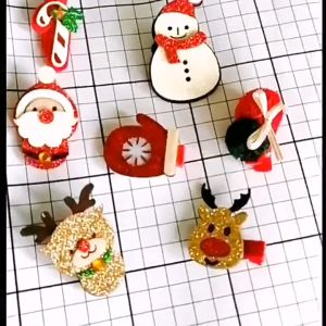 Set 2 kẹp tóc cho bé hình ông già noel người tuyết