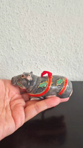 2005 Lynn Chase hanging Christmas ornamnent (hippo with holly leaves)