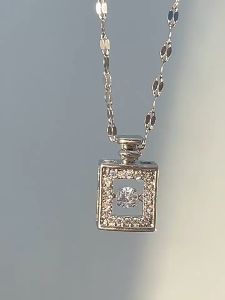 Ladamas Kalung Titanium Dengan Liontin Botol Parfum Permata Bisa Bergerak Gaya Elegan KT107