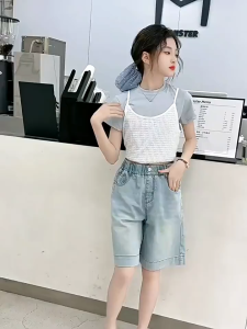 130-160m กางเกงยีนส์เด็กผู้หญิง กางเกงยีนส์ขาสั้นเด็กผู้หญิง การออกแบบปัก เอวสูง เอวยางยืด เวอร์ชั่นเกาหลี แฟชั่น 2025 ใหม่