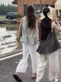 Elegant Silk-Linen Blend Two-Piece Set Women's V-Neck Flared Sleeveless Top and Wide Leg Crop Pants. 