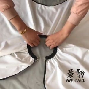 ชุดคลุมตัดผม เจาะช่องใส ผ้าไนลอน เกรดพรีเมี่ยม มีพลาสติกใสกลางท้อง มีให้เลือก 5สี