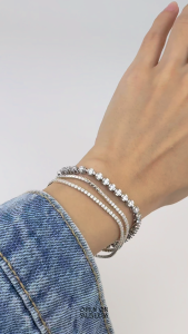 Open on Museum - Tiny Tennis Bracelet สร้อยข้อมือเงินแท้ พลอย White Zirconia รุ่น Tennis