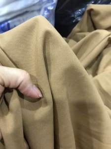 Vải Cotton Boi màu vàng bò dày vừa mềm rũ co giãn nhẹ (khổ 1m5)may đầm váy vestquần suông áo kiểu comple thời trang