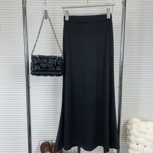 กระโปรงทรงเอผ้าขนสัตว์ผสมคอตตอนแบบมีฮู้ดสไตล์ฝรั่งเศสย้อนยุคสำหรับผู้หญิง ฤดูใบไม้ร่วง/ฤดูหนาว เอวสูง กระโปรงยาวคลุมเข่า สีสันสดใส