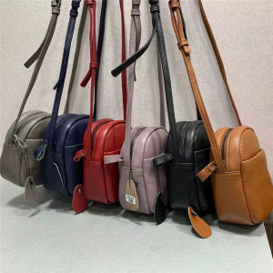 กระเป๋าใบเล็กหนังแท้แฟชั่นสไตล์ลําลองสลิงไหล่เดี่ยวสําหรับเยาวชนปิดซิปหนังวัวชั้นบนสุด