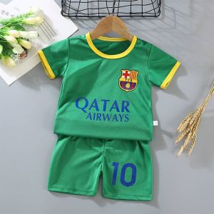 Kids Football Jersey Set with Real Madrid Brazil Portugal Qatar Airways and Rakuten Designs. White Yellow Pink Red Green and Black Kits. Blue and Yellow Trim. Suitable for Sports and Play.