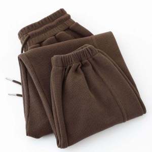 กางเกงวอร์มทรงหลวมสำหรับผู้ชายไซส์ใหญ่ ทรงหลวมสบาย ๆ กางเกงขายาวทรงสปอร์ตทรงหลวมสบาย ๆ สำหรับฤดูใบไม้ร่วงและฤดูหนาว