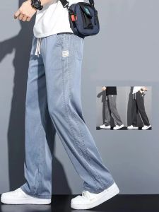 2025 ฤดูร้อนใหม่ผ้า Lyocell นุ่มกางเกงยีนส์ผู้ชายบางหลวมตรงกางเกง Drawstring ยืดหยุ่นเอวเกาหลีกางเกงสบายๆ