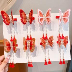Moving Butterfly & Red Tassel Hair Clips: Children's Festive New Year Accessories