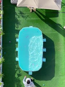 สระน้ํา สระว่ายน้ำครอบครัว สระว่ายน้ำเด็ก สระน้ำเฟรมพูลสี่เหลี่ยม กันสาดที่ถอดออกได้ PVC สระว่ายน้ำขนาดใหญ่