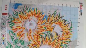 A vibrant sunflower cross-stitch kit DIY handmade embroidery material pack floral wall decoration painting precise printed patterns beginner-friendly embroidery