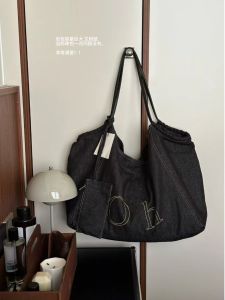 Korean Retro Denim Letter Shoulder Bag Womens Large Capacity Commuter Armpit Mommy Bag Fashionable Tote Handbag for Daily Use
