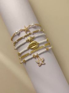 Dây Chuyền Mắt Cá Chân Nhiều Lớp Hạt Gạo Xếp Chồng Dành Cho Nữ Với Vỏ Sao Biển Tinh Xảo Trang Sức Chân Hợp Kim Kẽm Cổ Điển Dành Cho Các Bữa Tiệc Bãi Biển Hàng Ngày