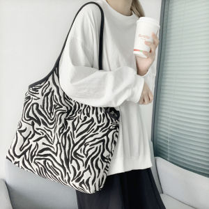 กระเป๋าผ้าแคนวาสแฟชั่นพร้อมรูปแบบม้าลายกระเป๋าสะพายความจุขนาดใหญ่สําหรับผู้หญิงนักเรียนมหาวิทยาลัยสถานการณ์ลําลอง