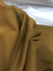 vải thun cotton Hàn co dãn 4 chiều _( khổ 1m65) màu vàng bò dày vừa mềm không nhão may đầm váy áo quần vv