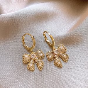 Golden Butterfly Knot Dangle Earrings Womens Fashion Jewelry Elegant Atmosphere Luxury Feelings New 2025 Model Ear Jewelry