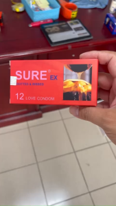 ( CHE TÊN SẢN PHẨM KHI GIAO HÀNG) BAO CAO SU SURE EX ĐỎ HỘP 12 CÁI - MADE IN MALAYSSIA