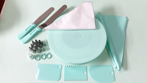cake decorating set with turntable piping bags tips spatulas and tools.