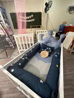 White adjustable crib with uratex foam and big bolster set