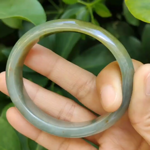 Crafted as Oval Shape bangle size 56 mm on Rare High Quality Natural Type A Jadeite Jade certificate weighs 46.53 grams Width: 14.1 mm Thickness: 6.5 mm (bangle23)