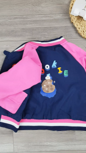 [HỎA TỐC] Áo khoác gió cho bé 8-25Kg bomber 2 lớp phối màu hồng in hình cookie phong cách đáng yêu Urombbay