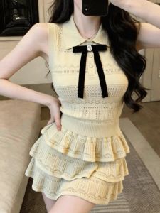 GUZILIAN | Bộ Áo Knit Không Tay Kiểu Duyên Dáng Với Nơ Và Chân Váy Xếp Ly