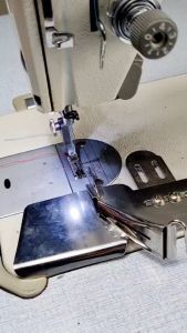 ซองกู้จักรยอดนิยม ซองกู้อุตสาหกรรมเข็มเดี่ยว ซองกู้กับซองกู้ ซองกู้เบาดูแลแบบไม่เปลี่ยนฟันจักร ซองกู้สำหรับช่างผ้าเย็บผ้าเป็นการกู้แบบโคน เก็บโคน