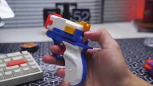 Súng Bắn Dây Thun Mini Nhiều Màu 3D – Chất Liệu Nhựa Cao Cấp Bắn Nhanh An Toàn Cho Bé Từ 6+ Tuổi