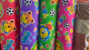 ผ้าเมตร ผ้าโพลีเยสเตอร์ ลายการ์ตูน ลายหมี ลายสิงโต ราคาถูก หน้ากว้าง 45 นิ้ว หน่วยขายเป็นเมตร