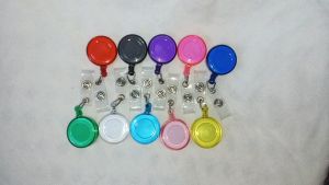 RETRACTABLE REEL BADGE ID CLIP AND KEY HOLDER