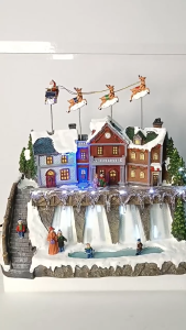 ONELINE #F22011 Polyresin Christmas Village With Music And Animated Santa Sleigh
