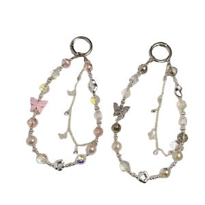 เคสโทรศัพท์พร้อมจี้ห้อยคอลูกปัดรูปโบว์อัลลอยด์สุดหรูน้ำหนักเบาลูกปัดคริสตัลดังอินเทอร์เน็ต