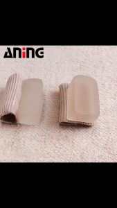 บิ๊กนิ้วเท้าที่หนีบผมตรงสนับสนุนนิ้วหัวแม่มือเจลป้องกันบริเวณปรารถต่อไปยัง 1 ชิ้น