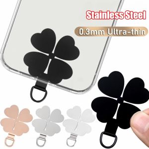 แผ่นแปะสายชาร์จมือถือโลหะรูปใบโคลเวอร์สี่แฉกปะเก็นแผ่นรองเพื่อความปลอดภัยในการทดแทนเหล็กสเตนเลสแบบบางเฉียบ