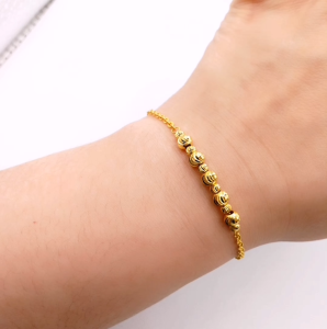 Yon Hing Rantai Tangan P olo Laser Cut Bola Emas 916