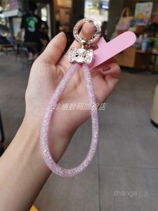 สร้อยคอโทรศัพท์มือถือประดับคริสตัล สายคล้องแขนแบบสั้น ดีไซน์หรูหรา หนังสือพิมพ์สีเขียว สายคล้องโทรศัพท์มือถือแบบป้องกันการตกหล่น