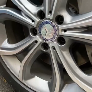 ฝาครอบล้อ Mercedes-Benz ดีไซน์ AMG มาตรฐานโรงงาน สำหรับ C/S/E/A-Class และ GLC/GLA/GLK เปลี่ยนภาพลักษณ์รถในราคาประหยัด - รับประกันสินค้าคุณภาพ