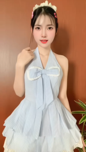 Outfit trẻ trung dễ thương set đi tiệc áo đính nơ phối Ren mix chân váy xếp ly dáng ngắn có quần