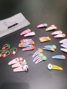 กิ๊บติดผมคละแบบ แถมถุงเก็บเป็นซิปรูด (ACC211)