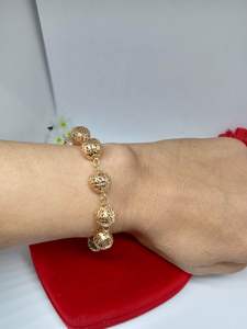 สร้อยข้อมือนาก สร้อยข้อมือโรสโกลด์ หญิง ลายเม็ดกลมฉลุ