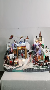 ONELINE F24055 Musical LED House Flying Santa Sleigh Scene Christmas Village