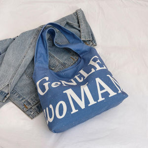 กระเป๋าผ้าใบพิมพ์ลายตัวอักษรความจุขนาดใหญ่ กระเป๋าสะพายไหล่ข้างเดียวสำหรับคุณแม่ กระเป๋าช้อปปิ้งแบบทันสมัย ​​วัสดุผ้าใบ