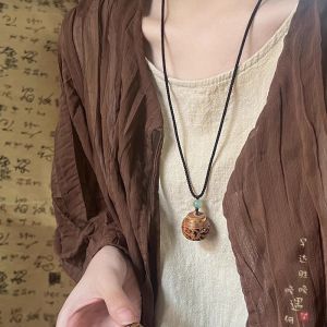 Retro Rosewood Hollow Pendant Long Rope Necklace Womens New Chinese Style Ancient Sweater Chain Necklace Accessories